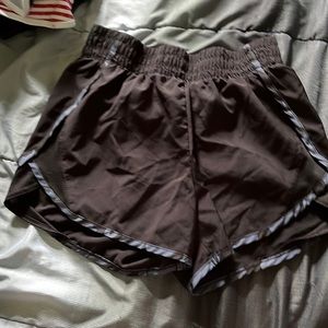 Athletic works XL size 14-16 black athletic shorts with camo print trim